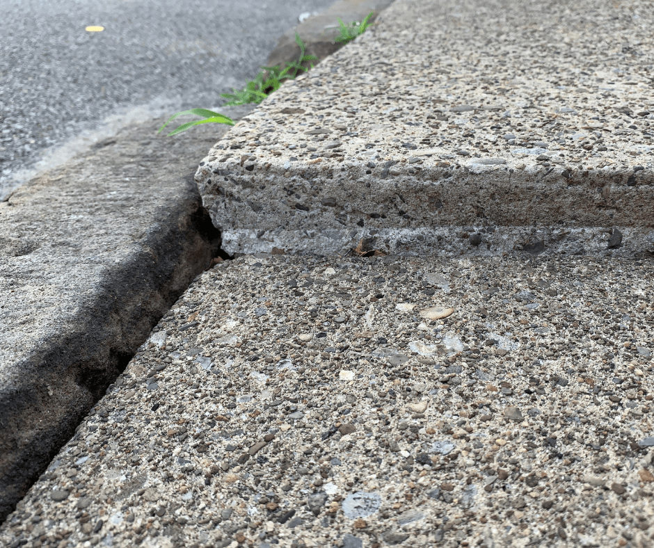 uneven sidewalk in need of foam concrete leveling